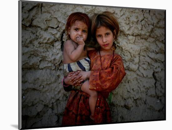 Afghan Girl Holds Her Younger Sister in Nangarhar Province, East of Kabul, Afghanistan-null-Mounted Photographic Print