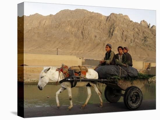 Afghan Kids Ride on a Horse Carriage in Kandahar City, Afghanistan-null-Stretched Canvas