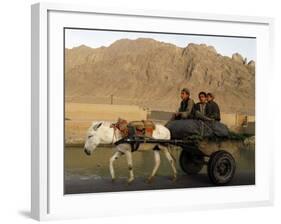 Afghan Kids Ride on a Horse Carriage in Kandahar City, Afghanistan-null-Framed Photographic Print