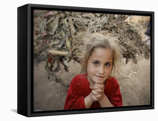 Afghan Refugee Child Looks on in a Neighborhood of Rawalpindi, Pakistan-null-Framed Stretched Canvas