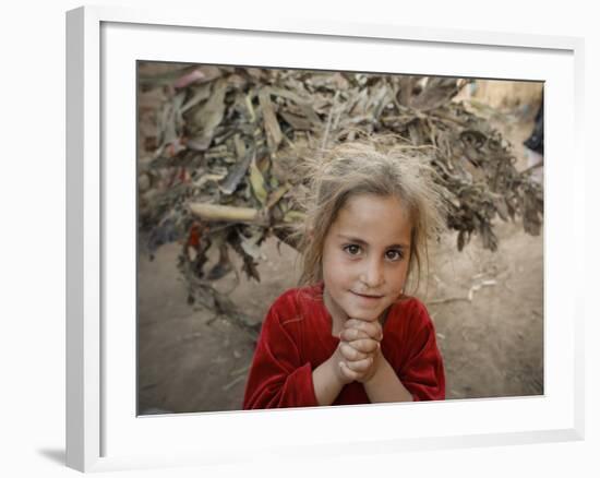 Afghan Refugee Child Looks on in a Neighborhood of Rawalpindi, Pakistan-null-Framed Photographic Print