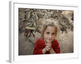 Afghan Refugee Child Looks on in a Neighborhood of Rawalpindi, Pakistan-null-Framed Photographic Print