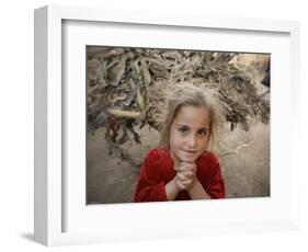 Afghan Refugee Child Looks on in a Neighborhood of Rawalpindi, Pakistan-null-Framed Photographic Print