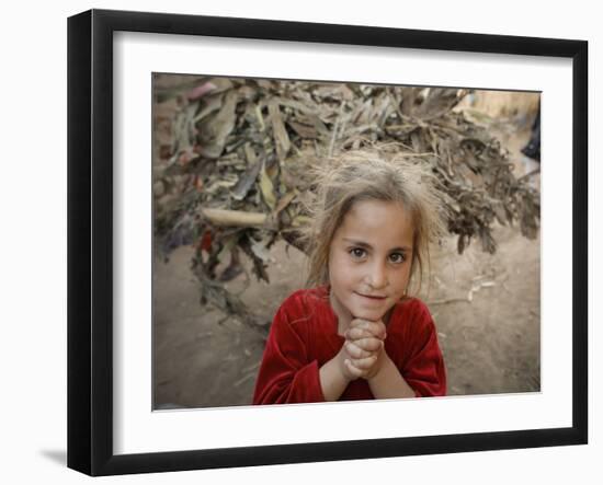 Afghan Refugee Child Looks on in a Neighborhood of Rawalpindi, Pakistan-null-Framed Photographic Print