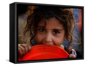 Afghan Refugee Child Who Lives in Slum Area of Lahore City in Pakistan Waits to Get Water-null-Framed Stretched Canvas