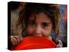 Afghan Refugee Child Who Lives in Slum Area of Lahore City in Pakistan Waits to Get Water-null-Stretched Canvas