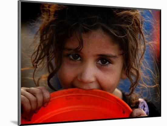 Afghan Refugee Child Who Lives in Slum Area of Lahore City in Pakistan Waits to Get Water-null-Mounted Photographic Print