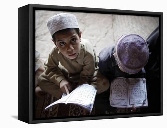 Afghan Refugee Children Read Verses of the Quran During a Daily Class at a Mosque in Pakistan-null-Framed Stretched Canvas