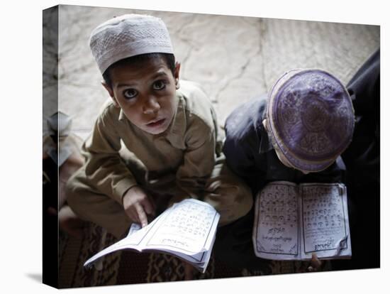 Afghan Refugee Children Read Verses of the Quran During a Daily Class at a Mosque in Pakistan-null-Stretched Canvas