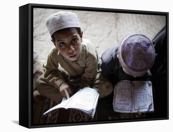 Afghan Refugee Children Read Verses of the Quran During a Daily Class at a Mosque in Pakistan-null-Framed Stretched Canvas