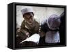 Afghan Refugee Children Read Verses of the Quran During a Daily Class at a Mosque in Pakistan-null-Framed Stretched Canvas