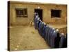 Afghan Women Wearing Burqa Line up to Vote at a Polling Station-null-Stretched Canvas