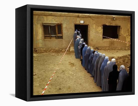 Afghan Women Wearing Burqa Line up to Vote at a Polling Station-null-Framed Stretched Canvas