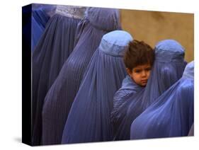 Afghan Women Wearing Burqas Line Up to Vote at a Polling Station in Kabul-null-Stretched Canvas