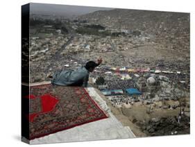 Afghan Youth Sits on a Rooftop During the Celebration of Nowruz-null-Stretched Canvas