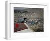 Afghan Youth Sits on a Rooftop During the Celebration of Nowruz-null-Framed Photographic Print
