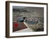 Afghan Youth Sits on a Rooftop During the Celebration of Nowruz-null-Framed Photographic Print