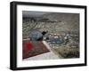 Afghan Youth Sits on a Rooftop During the Celebration of Nowruz-null-Framed Photographic Print