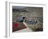 Afghan Youth Sits on a Rooftop During the Celebration of Nowruz-null-Framed Photographic Print