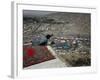 Afghan Youth Sits on a Rooftop During the Celebration of Nowruz-null-Framed Photographic Print