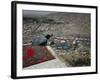 Afghan Youth Sits on a Rooftop During the Celebration of Nowruz-null-Framed Photographic Print