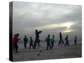 Afghan Youths Warm up Themselves Before a Soccer Match-null-Stretched Canvas