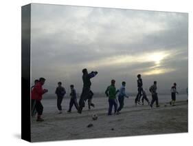 Afghan Youths Warm up Themselves Before a Soccer Match-null-Stretched Canvas