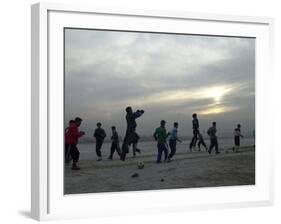 Afghan Youths Warm up Themselves Before a Soccer Match-null-Framed Photographic Print