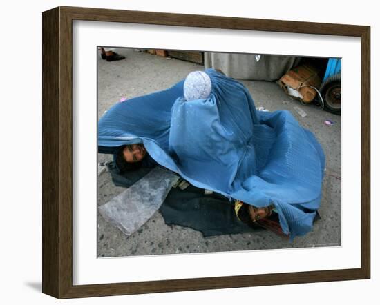 Afghans Girls Look out from the Burqa of Their Mother-null-Framed Photographic Print