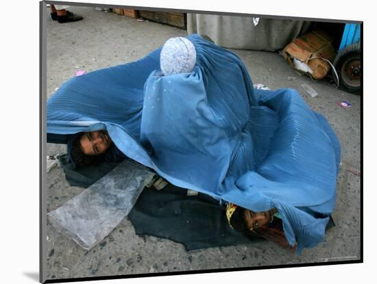 Afghans Girls Look out from the Burqa of Their Mother-null-Mounted Photographic Print