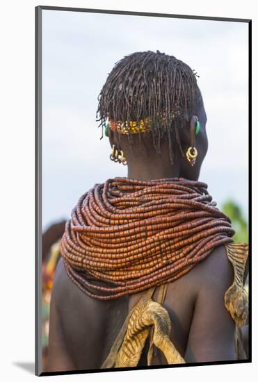 Africa, Ethiopia, Southern Omo Valley. Nyangatom woman wear heavy beads and other decorations.-Ellen Goff-Mounted Photographic Print