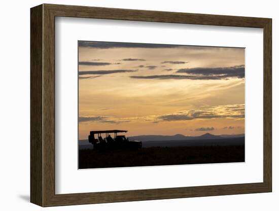 Africa, Kenya, Northern Serengeti Plains, Maasai Mara. Mara sunrise with safari jeep silhouette.-Cindy Miller Hopkins-Framed Photographic Print