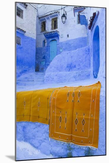 Africa, Morocco, Chefchaouen. Rugs Draped on a Wall in the Blue Town-Brenda Tharp-Mounted Photographic Print