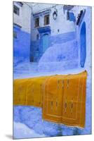 Africa, Morocco, Chefchaouen. Rugs Draped on a Wall in the Blue Town-Brenda Tharp-Mounted Premium Photographic Print