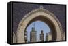 Africa, Morocco, Fes. an Arch with Classic Moorish Decor Frames Two Minarets-Brenda Tharp-Framed Stretched Canvas