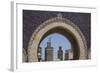 Africa, Morocco, Fes. an Arch with Classic Moorish Decor Frames Two Minarets-Brenda Tharp-Framed Photographic Print