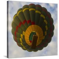 Africa. Tanzania. Hot air balloon crossing the Mara River, Serengeti National Park.-Ralph H. Bendjebar-Stretched Canvas