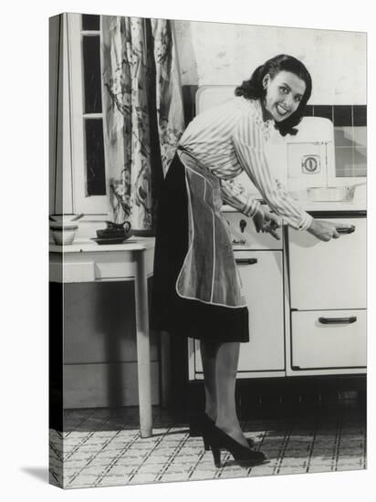 African American Actress Lena Horne at a Gas Stove-null-Stretched Canvas