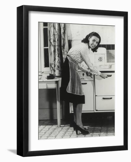 African American Actress Lena Horne at a Gas Stove-null-Framed Photo