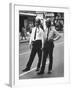 African American and Caucasian Cops on Duty During Hospital Strikers' Protest March-null-Framed Photographic Print