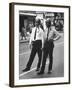 African American and Caucasian Cops on Duty During Hospital Strikers' Protest March-null-Framed Photographic Print