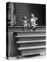 African American Boys at top of Stairs as Older Boy is Drinking Soda and Younger One Reaches for It-Alfred Eisenstaedt-Stretched Canvas