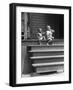 African American Boys at top of Stairs as Older Boy is Drinking Soda and Younger One Reaches for It-Alfred Eisenstaedt-Framed Photographic Print