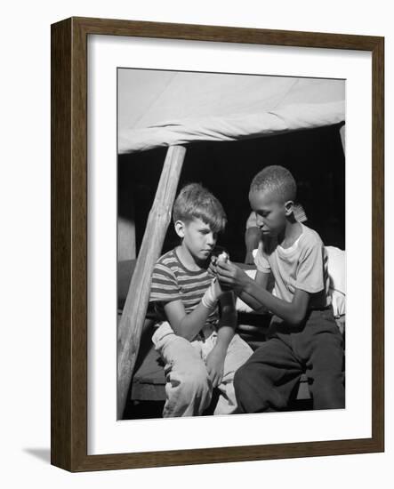 African American Camper Helps a White Bubby with His Bandaged Hand-Gordon Parks-Framed Photo