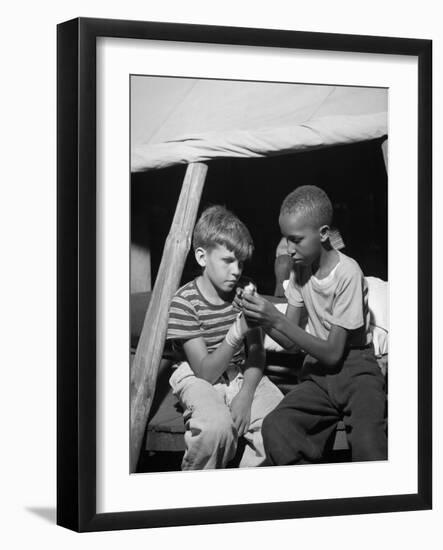 African American Camper Helps a White Bubby with His Bandaged Hand-Gordon Parks-Framed Photo