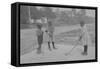 African American Children Pretend to Play Golf on Country Road-null-Framed Stretched Canvas