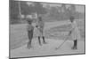 African American Children Pretend to Play Golf on Country Road-null-Mounted Art Print