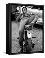 African American Man Relaxing on His Motocycle During Motorcycle Races near Detroit, Michigan-John Shearer-Framed Stretched Canvas