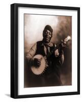 African American Man Seated and Holding Banjo, 1911-null-Framed Photo