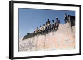 African American Members of the Street Gang 'Devil's Disciples' on a Graffiti Wall, 1968-Declan Haun-Framed Photographic Print